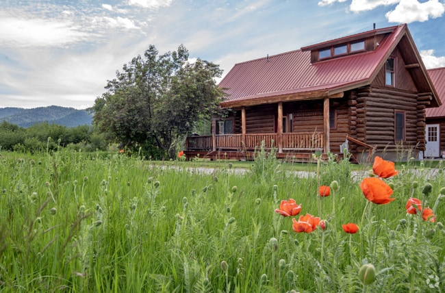 Building Photo - Charming Log Cabin and Carriage House – Do...