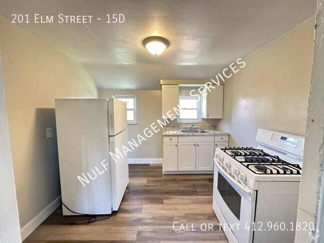 Building Photo - 2 bed, 1 bath Apartment in Neville Township Unit 15D