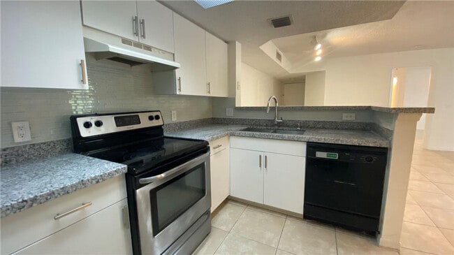 5045 Wiles Rd Unit 205