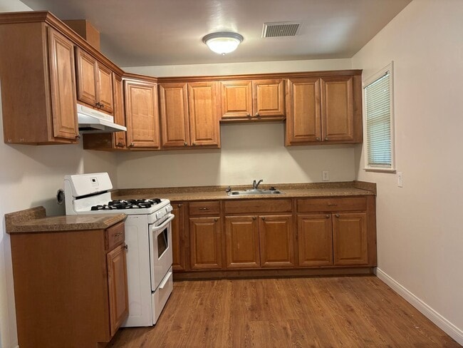 Photo - Central North home with big backyard, dual pane windows & more!