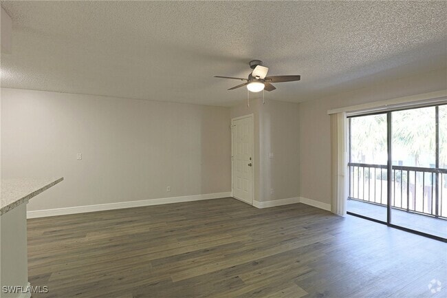 Building Photo - 5305 Summerlin Rd Unit 515 Rental
