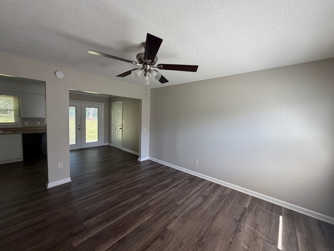 3BR/2BA Huntsville Rental with 1-Car Garage, Hardwood Flooring & Fenced Yard