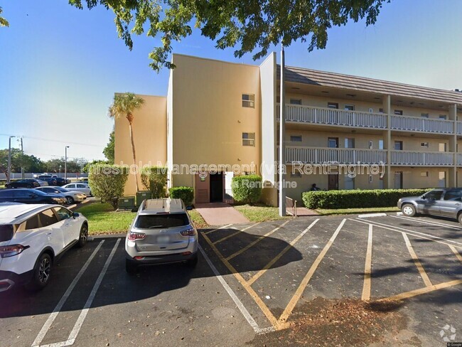 Building Photo - 6090 NW 64th Ave Unit 301 Rental