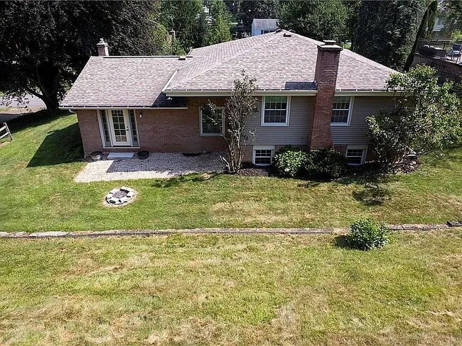 Photo - Charming 4-Bed Retreat with Finished Basem...