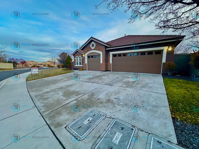 Photo - Open Kitchen, Expansive Living, and Covered Patio in Tranquil South Reno Near Trails, Parks & Sho...