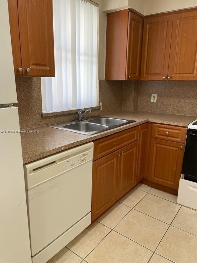 Building Photo - 6065 NW 186th St Rental