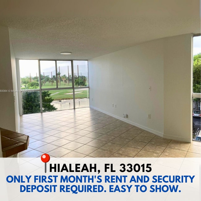 Building Photo - 6995 NW 186th St Unit E403 Rental