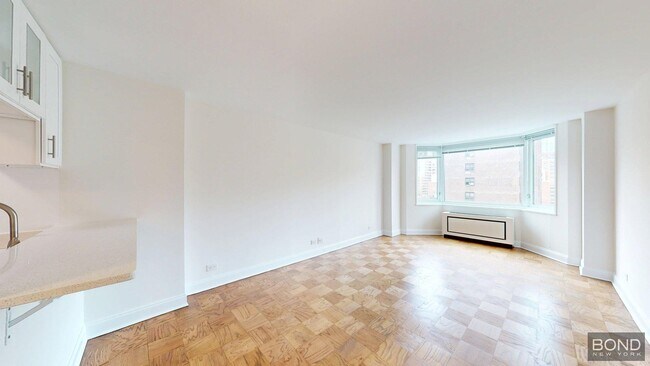 Building Photo - 400 E 71st St Unit 12F Rental