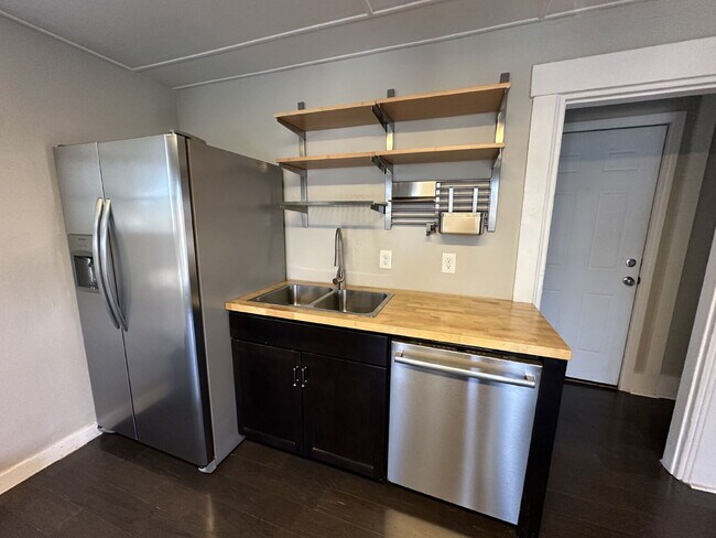 Photo - Bright & Spacious 3BR Second-Floor Apartment with 2-Story Living in Rochester!