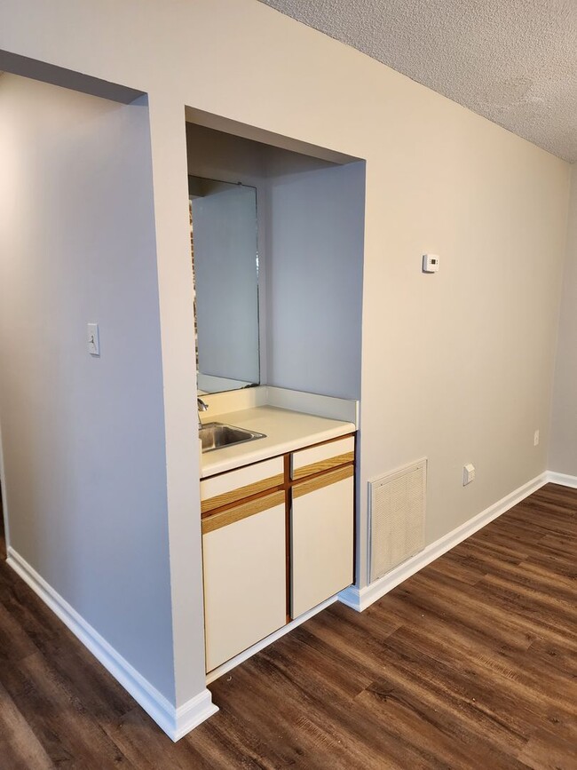 Photo - Spacious 2 bedroom 2 bath townhome with walk in closets, fireplace, and washer/ dryer included.