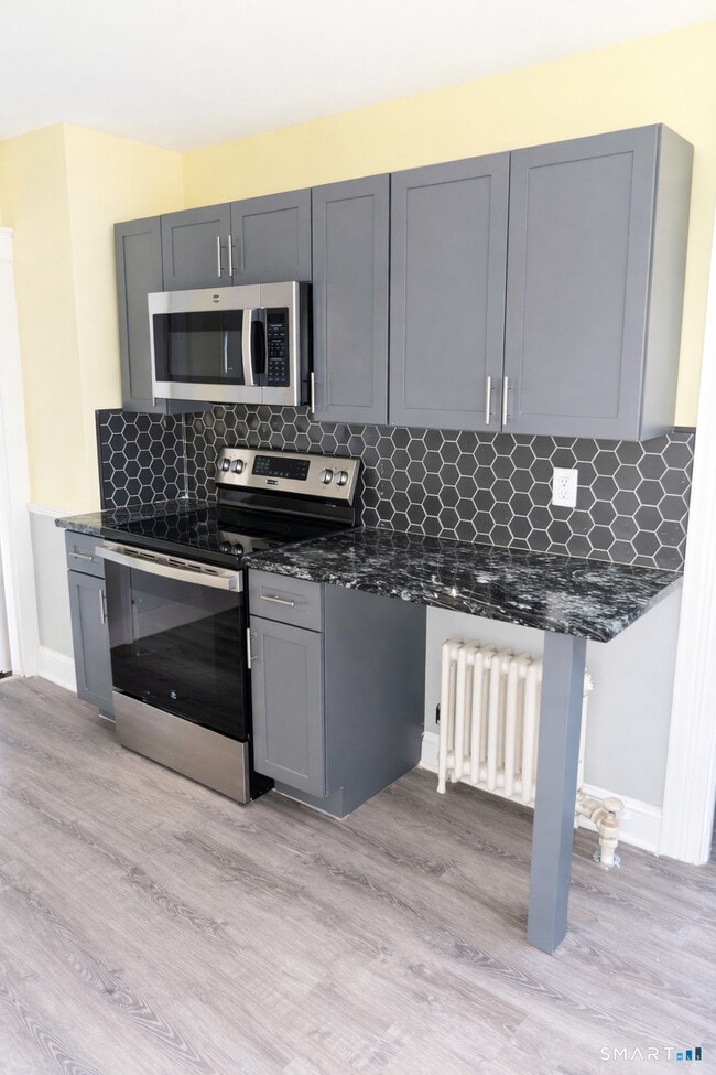 Building Photo - 65 Wooding St Unit 2