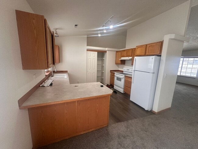 Photo - Newer Carpet, flooring & paint! 3 Bedroom 2 Bath with 2 car attached garage.