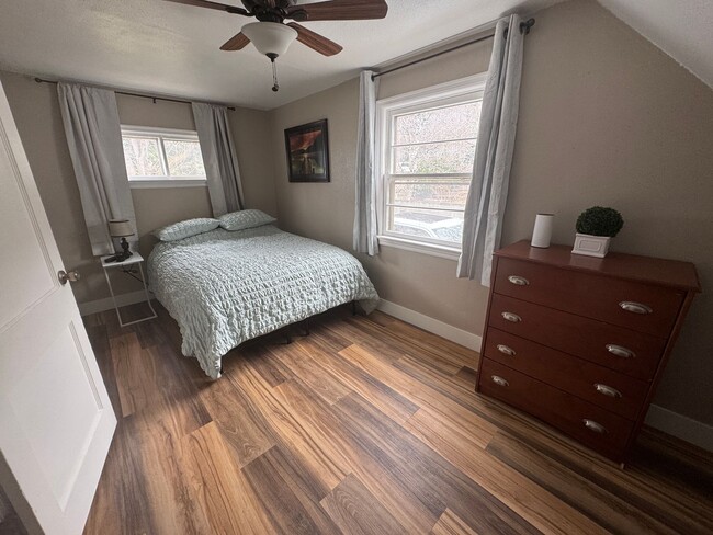 Photo - Gorgeous 4-Bedroom Home with Expansive Landscaped Yard & Off-Street Parking – Fully Furnished!