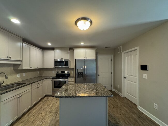 Photo - 3 Bed 2.5 Bath Home with Spacious Fenced Backyard