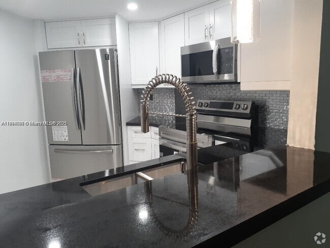 Building Photo - 9421 Fontainebleau Blvd Unit 212-35 Rental