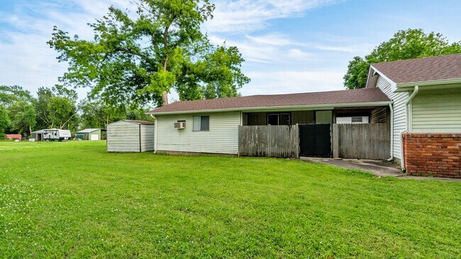 Photo - 1307 S 77th E Ave Unit Back