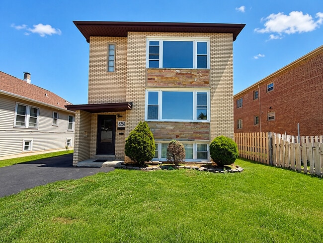 Building Photo - 6029 S Keating Ave Unit 2