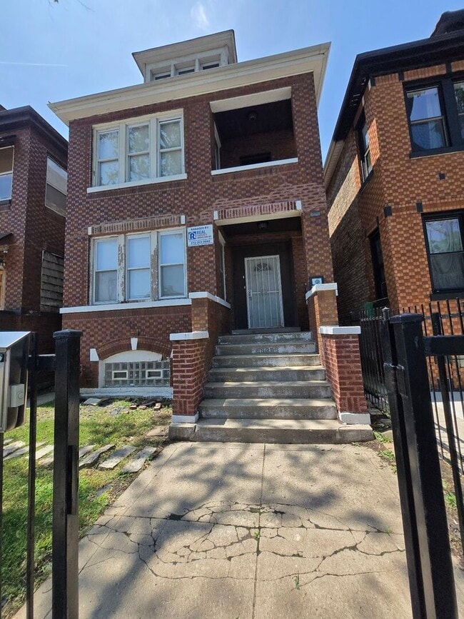 Building Photo - 6838 S Maplewood Ave Unit 1 Rental