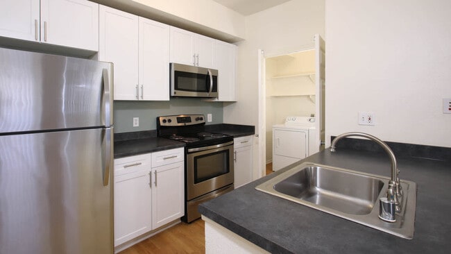 Kitchen with Stainless Steel Appliances - Sonterra at Foothill Ranch