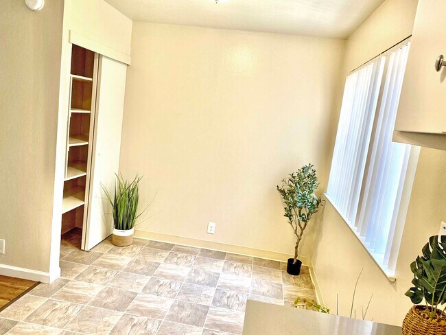 Dining area with Window and Pantry - 369 palm ave Unit 27