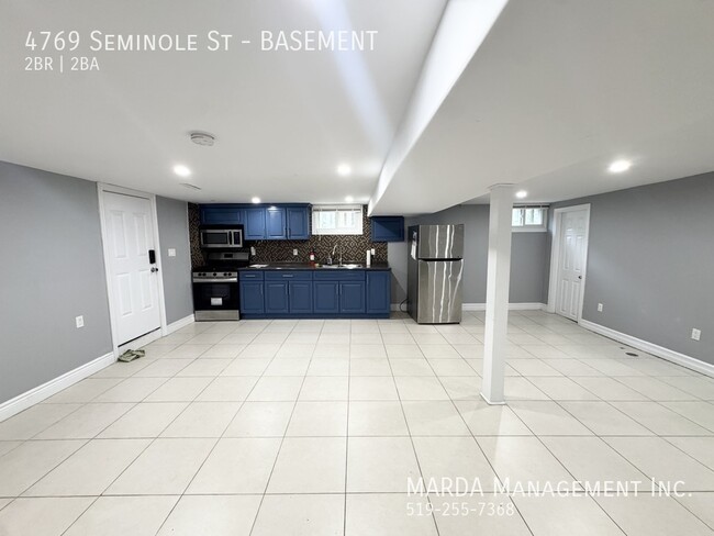 Building Photo - COZY 2 BED/2 BATH BASEMENT Unit BASEMENT