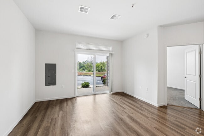 Madison 1BR, 1BA W/ Study - 942SF - Living Room - Red Mill Crossings