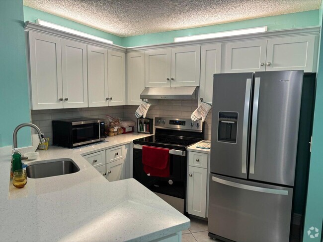 Building Photo - 7523 S Oriole Blvd Unit 102 Rental