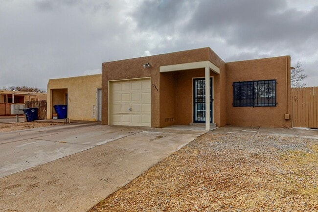 Building Photo - NE 1057 SF 3 Bedroom 2 Bath