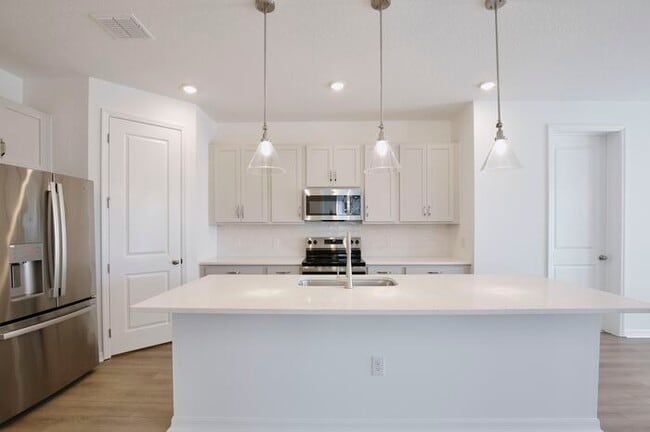 Photo - Stylish Sunbrooke Sanctuary! Modern 4/2 Home with High Ceilings, Designer Kitchen & Resort Amenities