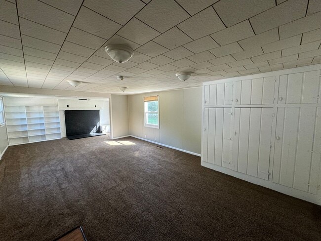 Photo - Spacious 3-Bedroom, 1-Bathroom Home with Pole Building – $1,525/Month