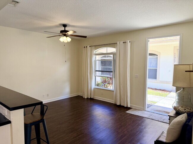 Photo - "Charming 3-Bed, 2-Bath Oasis in Wellington's Heart – 1060 Sqft of Comfort Awaits!"