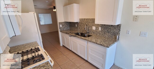 Photo - Valencia Rd & Headley Rd 3/2 - Coming Soon - All tile floors and updated kitchen