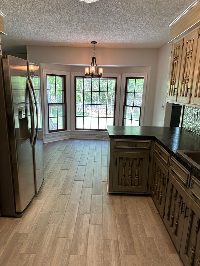 Photo - Beautiful 4 Bedroom 2 baths 2 car garage