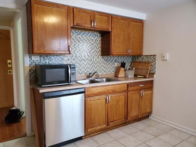 Large Eat- in kitchen, new appliances - 4752 N Menard Ave Condo Unit 1N