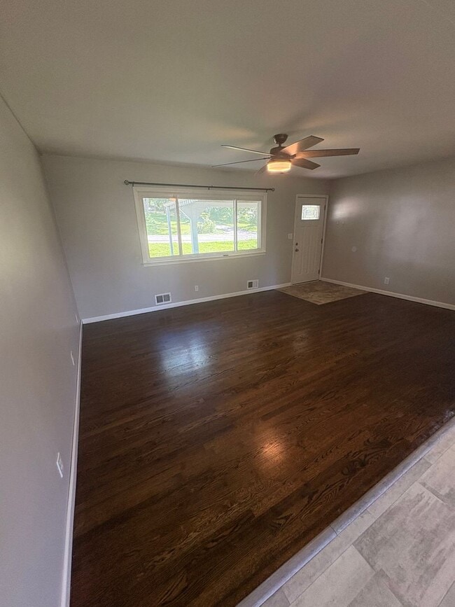 Photo - Spacious 4 Bed / 2.5 Bath Home on Nearly 3/4 Acre Lot with Walkout Basement and Multiple Living A...