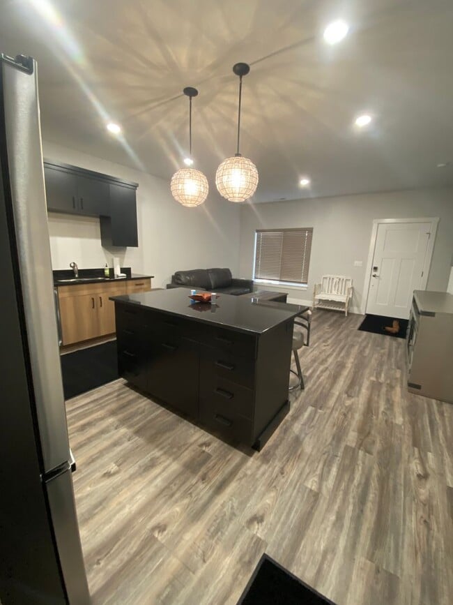 Photo - Fully Furnished 2BR, 2.5 Bathroom Townhome With attached 2 car Garage