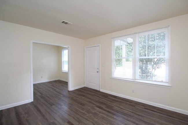Photo - 2BR Cottage Home with LVP Flooring Throughout, Bonus Sunroom, Covered Parking & Low-Maintenance L...