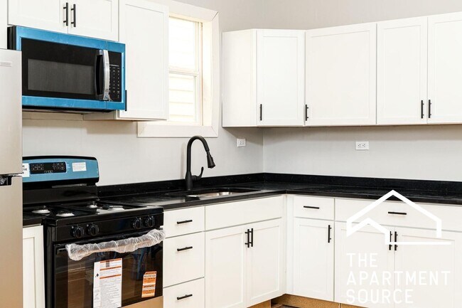 Building Photo - 3714 W Cortland St Unit 1A