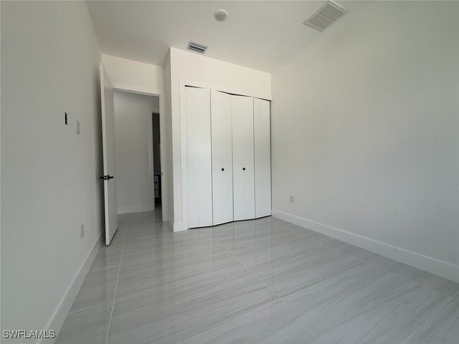 Building Photo - 1549 NW 26th Pl Rental