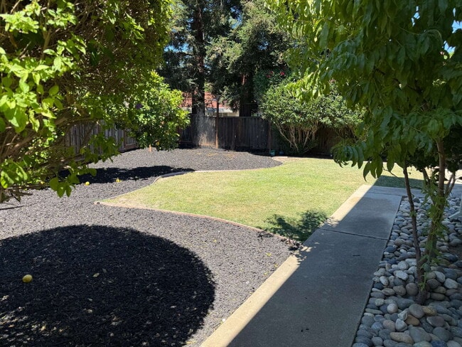 Photo - "Charming Walnut Creek Retreat: Spacious 4-Bedroom Home with Elegant Granite Kitchen, Cozy Firepl...