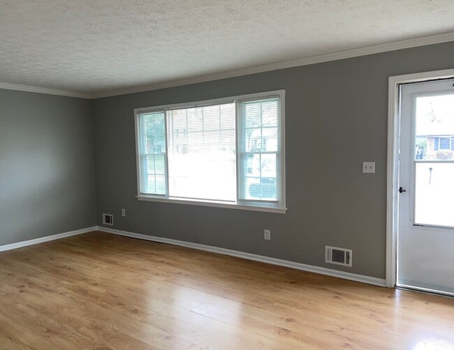 Photo - Remodeled 3 Bed/2.5 Bath w/ Laminate Hardwood Throughout...NO Carpet!