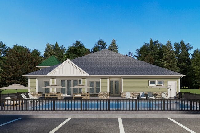 Exterior view of Greenwood Commons community clubhouse and pool. - Greenwood Commons Apartments