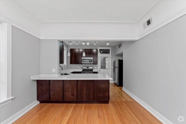 Building Photo - 4821 N Washtenaw Ave Unit 2 Rental