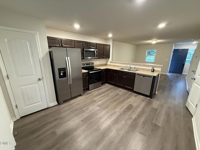 Building Photo - 2020 Wiggins Village Dr