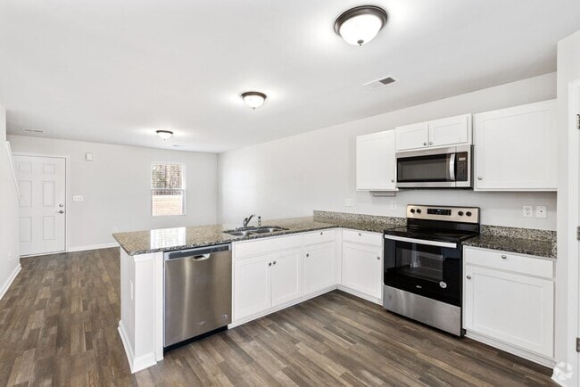 Building Photo - Charming 4 Bedroom- 3 Bath home located in...