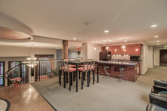 Photo - Top floor corner one-bedroom in the heart of it all, don't miss out, tour today!