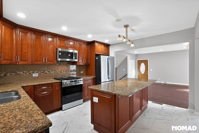 Photo - 7151 Hamlin Ave