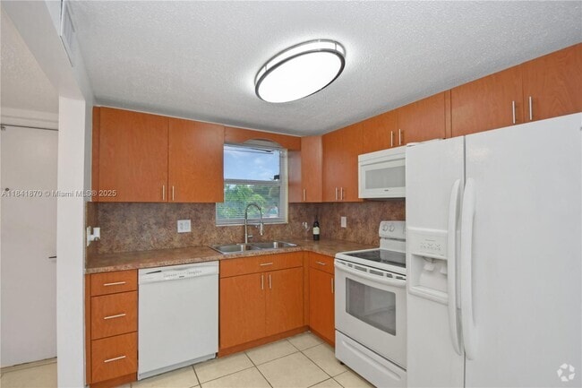 Building Photo - 6650 Royal Palm Blvd Unit 206C Rental