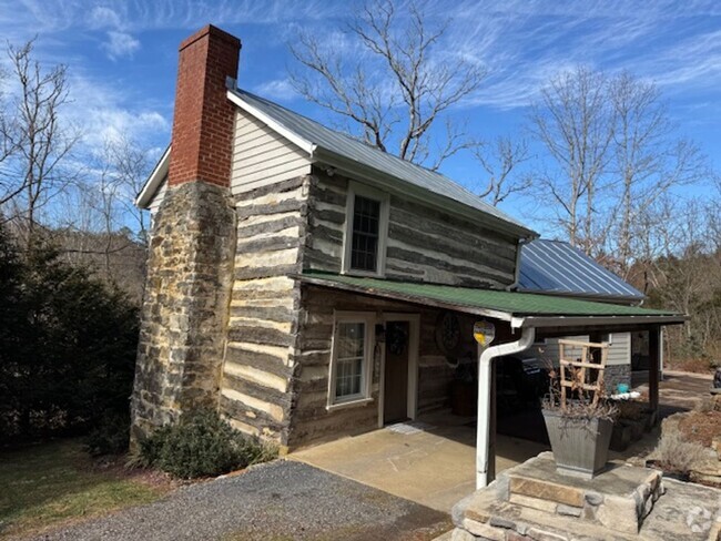 Building Photo - Renovated Log Cabin Rental