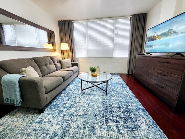 Building Photo - Modern Downtown Living with Comfort, Security & Style Unit 102